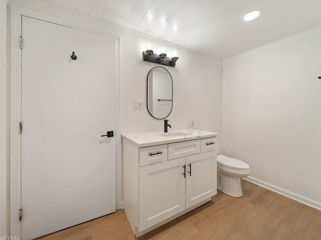 1150 Jerald Dr, Joliet, IL 60431 - bathroom with wood finished floors, toilet, and vanity