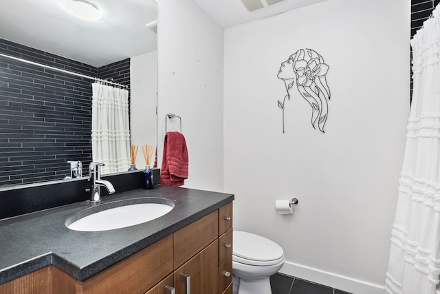 bathroom featuring tile patterned flooring, toilet, vanity, baseboards, and a shower with shower curtain