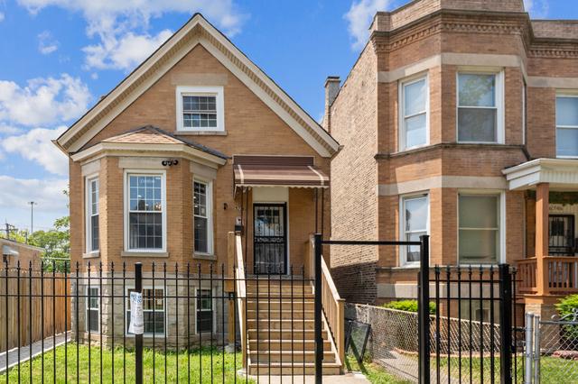 6748 S Wabash Ave, Chicago, IL 60637 - view of front of home with brick siding and a fenced front yard