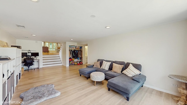 9405 Morgan Ave, Evanston, IL 60203 - living room featuring light wood-style floors, stairway, a desk, recessed lighting, and baseboards