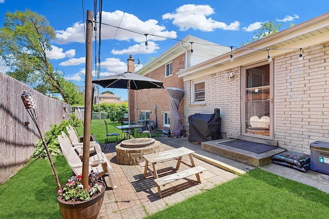 9405 Morgan Ave, Evanston, IL 60203 - view of patio featuring a fire pit