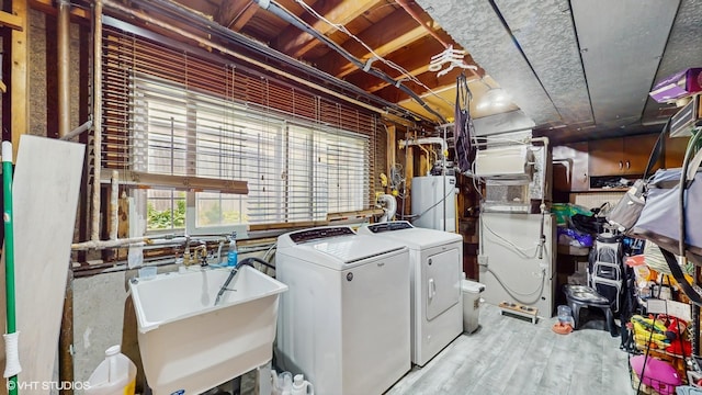 9405 Morgan Ave, Evanston, IL 60203 - laundry room with washing machine and dryer, gas water heater, wood finished floors, and heating unit