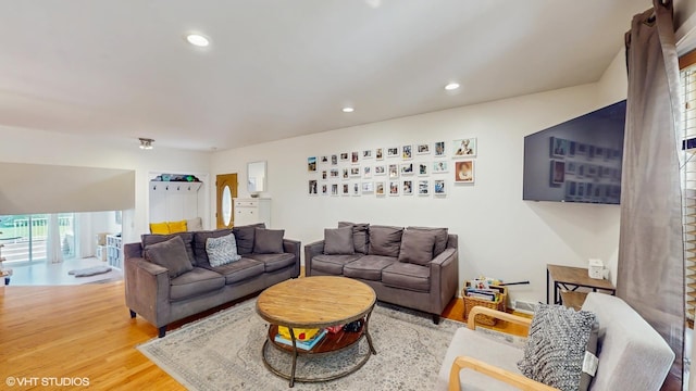 9405 Morgan Ave, Evanston, IL 60203 - living area featuring wood finished floors and recessed lighting