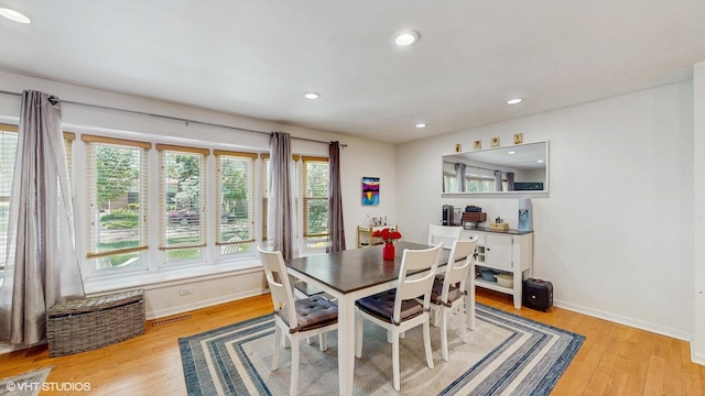 9405 Morgan Ave, Evanston, IL 60203 - dining area featuring baseboards, light wood finished floors, and recessed lighting