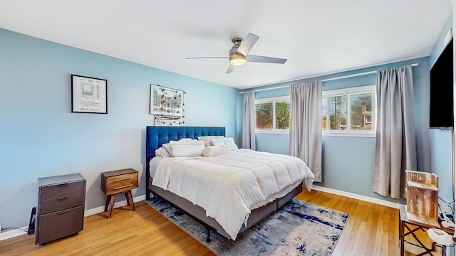 9405 Morgan Ave, Evanston, IL 60203 - bedroom with light wood-type flooring, baseboards, and ceiling fan