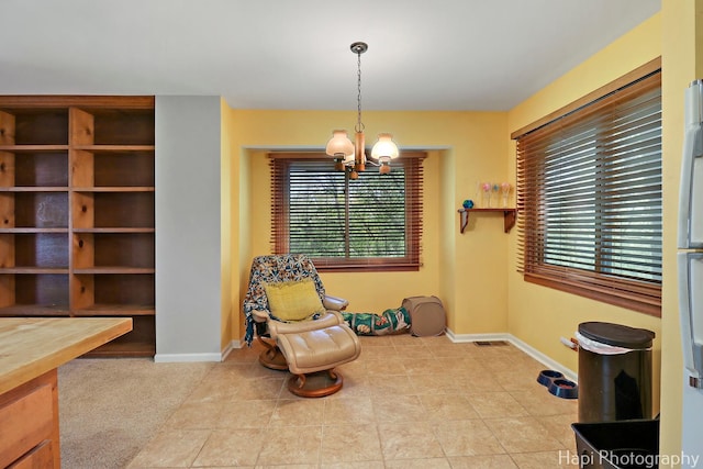 22665 W Depot St, Antioch, IL 60002 - unfurnished room featuring a chandelier, baseboards, and tile patterned flooring