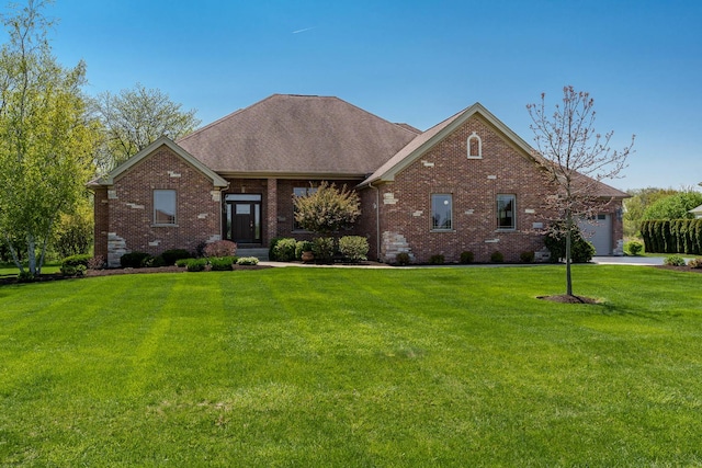 5344 River Run Parkway, Belvidere, IL 61008 - view of front of property featuring brick siding, a front lawn, an attached garage, and roof with shingles