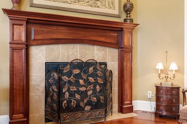 5344 River Run Parkway, Belvidere, IL 61008 - detailed view of wood finished floors and a tiled fireplace