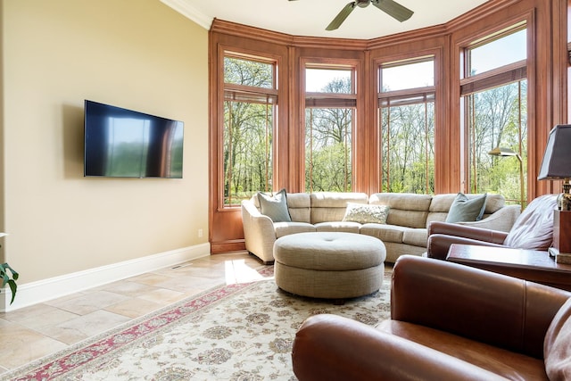 5344 River Run Parkway, Belvidere, IL 61008 - living area featuring baseboards, ceiling fan, and crown molding