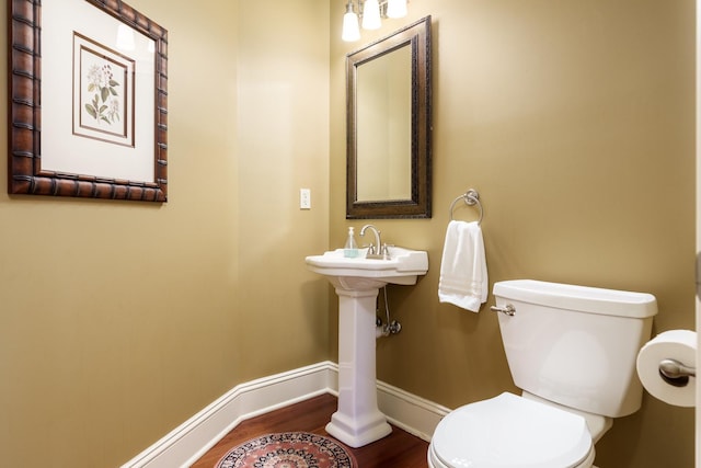 5344 River Run Parkway, Belvidere, IL 61008 - bathroom with baseboards, wood finished floors, and toilet
