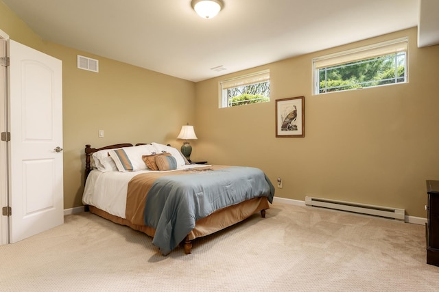 5344 River Run Parkway, Belvidere, IL 61008 - bedroom with a baseboard heating unit, light carpet, and baseboards