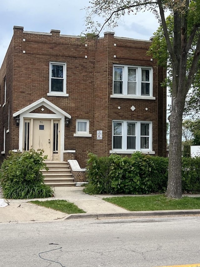 711 Mason Ave, Joliet, IL 60435 - view of front facade featuring brick siding