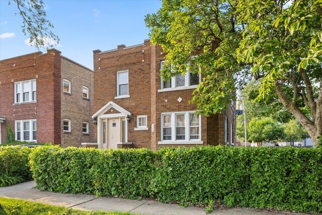 711 Mason Ave, Joliet, IL 60435 - view of front facade featuring brick siding