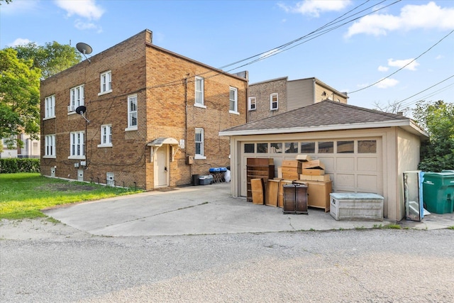 711 Mason Ave, Joliet, IL 60435 - view of property with a detached garage