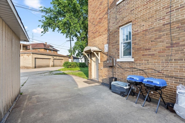 711 Mason Ave, Joliet, IL 60435 - view of patio / terrace featuring an outbuilding and a grill