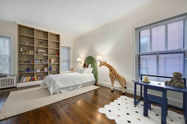 305 W Fullerton Pkwy Unit 4W, Chicago, IL 60614 - bedroom featuring ornamental molding, radiator, wood finished floors, and baseboards