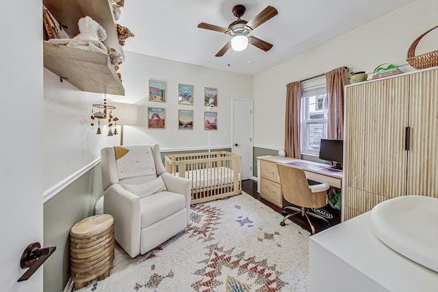 3152 N Clifton Ave, Chicago, IL 60657 - bedroom with a nursery area, a desk, and a ceiling fan