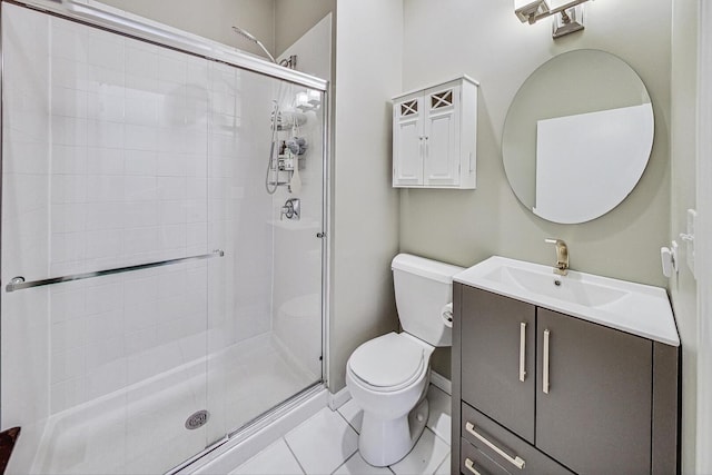 3152 N Clifton Ave, Chicago, IL 60657 - bathroom with toilet, a shower stall, vanity, and tile patterned flooring