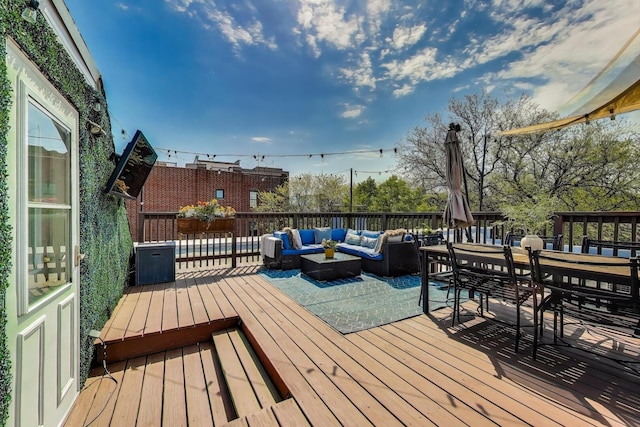 3152 N Clifton Ave, Chicago, IL 60657 - wooden deck with an outdoor hangout area and outdoor dining area