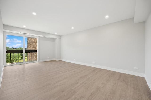 3851 Mission Hills Rd Unit 409, Northbrook, IL 60062 - empty room with light wood-style floors and recessed lighting