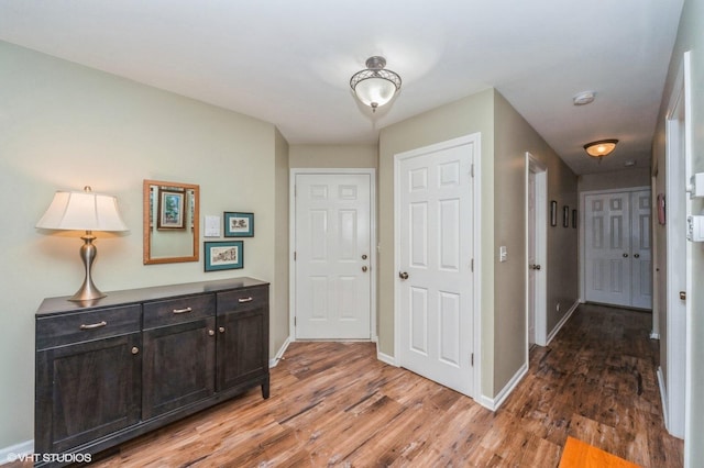 1402 Apricot Ct Unit A, Mount Prospect, IL 60056 - foyer entrance with light wood finished floors and baseboards