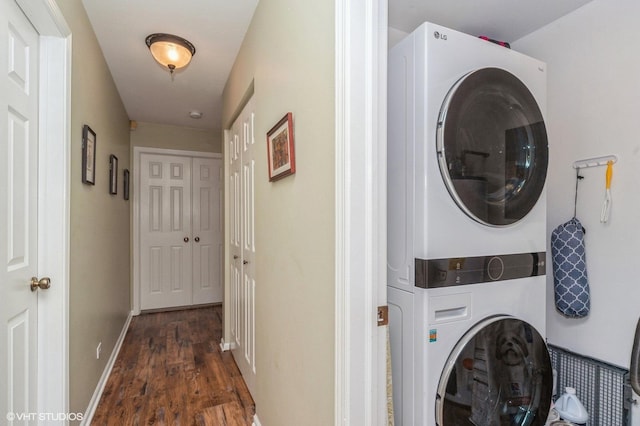 1402 Apricot Ct Unit A, Mount Prospect, IL 60056 - laundry area featuring stacked washer and clothes dryer, wood finished floors, and baseboards