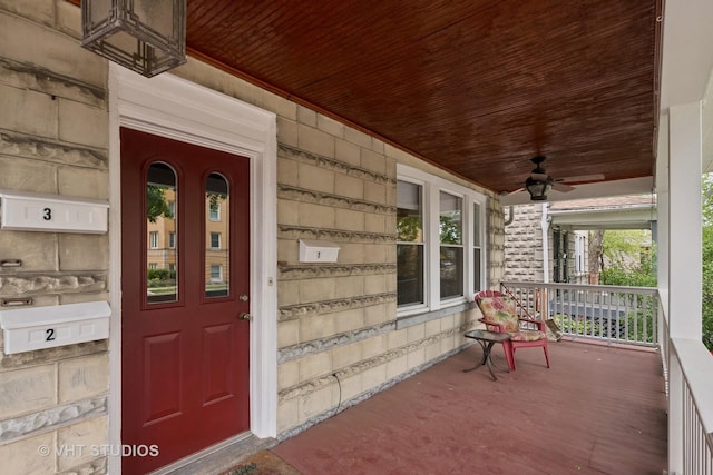 7223 Jackson Blvd, Forest Park, IL 60130 - property entrance with covered porch, ceiling fan, and stone siding