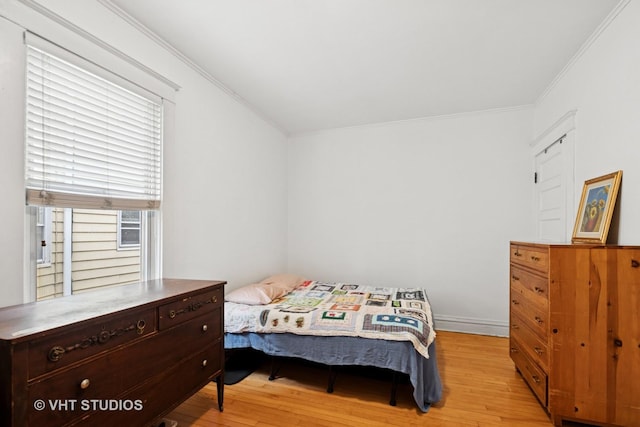 7223 Jackson Blvd, Forest Park, IL 60130 - bedroom featuring light wood-style flooring and crown molding