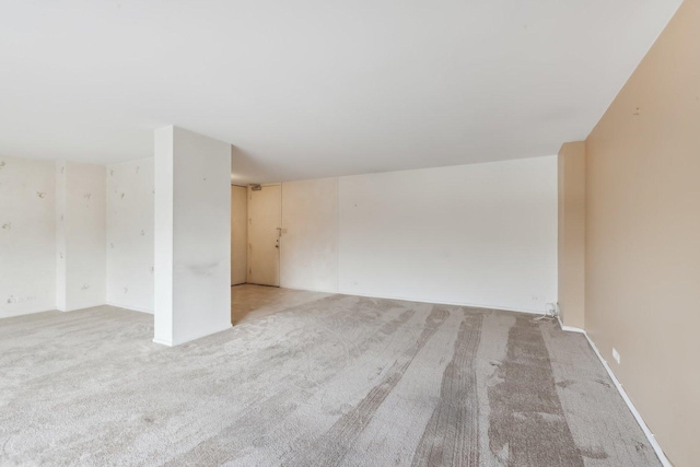 empty room with light carpet