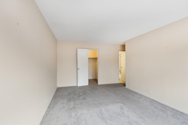 empty room with carpet flooring