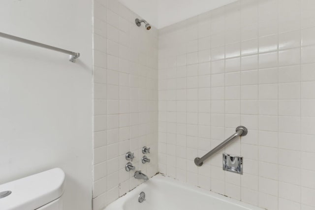 bathroom with toilet and shower / bathtub combination