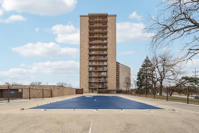 community pool with fence