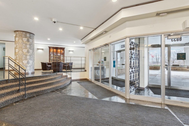 community lobby featuring recessed lighting and a security system