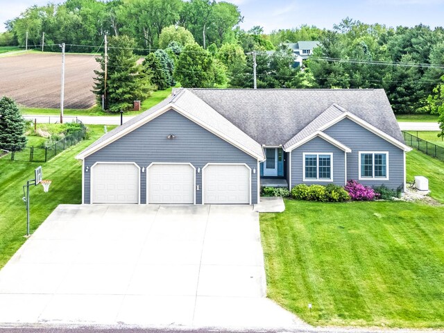 421 Sunset Dr, Colfax, IL 61728 - ranch-style home with driveway and an attached garage
