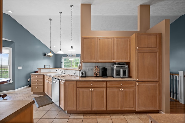 421 Sunset Dr, Colfax, IL 61728 - kitchen featuring dishwasher, high vaulted ceiling, light tile patterned floors, tasteful backsplash, and a sink