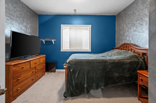 421 Sunset Dr, Colfax, IL 61728 - carpeted bedroom featuring a textured ceiling