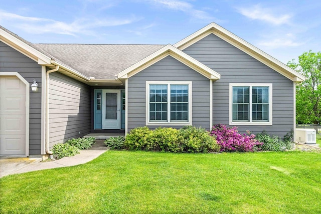 421 Sunset Dr, Colfax, IL 61728 - ranch-style home featuring a front lawn and a shingled roof