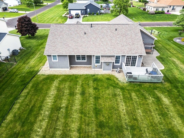 421 Sunset Dr, Colfax, IL 61728 - back of property with roof with shingles, central AC unit, and a residential view