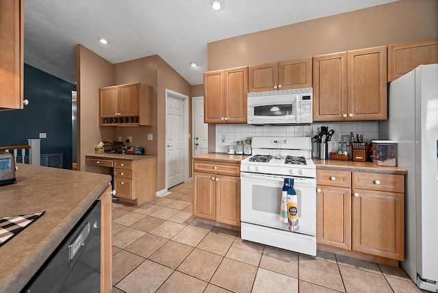 421 Sunset Dr, Colfax, IL 61728 - kitchen with white appliances, backsplash, light tile patterned floors, vaulted ceiling, and recessed lighting