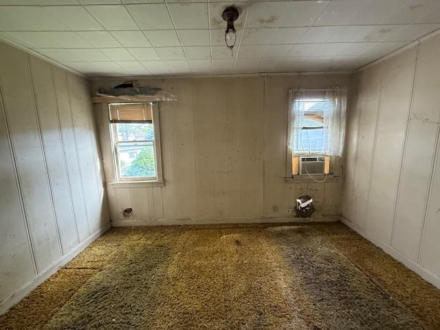 2843 N New England Ave, Chicago, IL 60634 - spare room featuring cooling unit and carpet floors