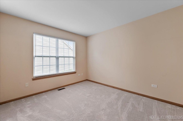 513 Coventry Ct, Oswego, IL 60543 - carpeted empty room featuring baseboards