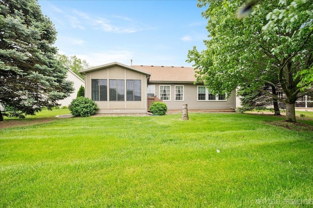 513 Coventry Ct, Oswego, IL 60543 - rear view of house featuring a yard and roof with shingles