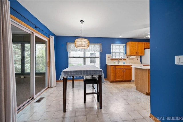 513 Coventry Ct, Oswego, IL 60543 - dining room featuring light tile patterned floors