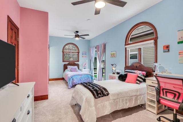 2407 N Villa Ln, Mchenry, IL 60051 - bedroom with light carpet, a ceiling fan, and baseboards