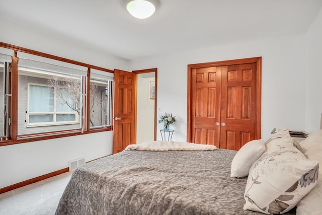 2407 N Villa Ln, Mchenry, IL 60051 - bedroom featuring carpet, a closet, and baseboards