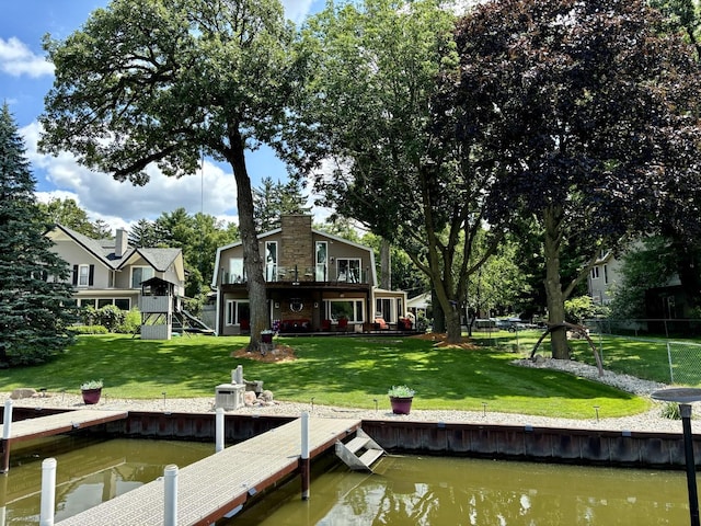 2407 N Villa Ln, Mchenry, IL 60051 - dock area featuring a lawn and a deck with water view