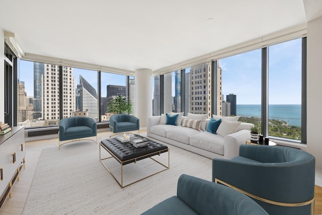 60 E Monroe St Unit 3007, Chicago, IL 60603 - living area with a view of skyline, plenty of natural light, and a water view