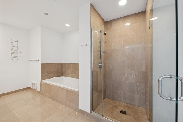 60 E Monroe St Unit 3007, Chicago, IL 60603 - bathroom featuring a garden tub, a shower stall, recessed lighting, and tile patterned floors
