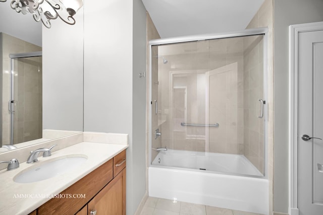 520 S Washington St Unit 201, Naperville, IL 60540 - bathroom featuring tile patterned floors, shower / bath combination with glass door, vanity, and baseboards