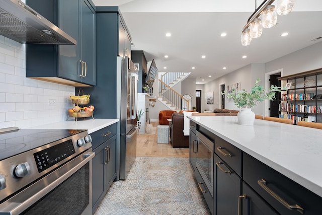 7929 N Octavia Ave, Niles, IL 60714 - kitchen featuring range hood, stainless steel appliances, light countertops, recessed lighting, and open floor plan